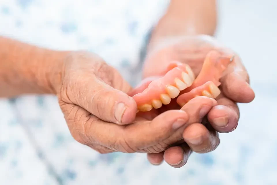 Implants vs Dentures Treatment